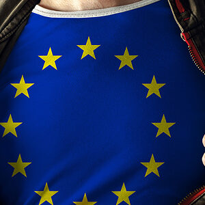 Man stretching jacket to reveal shirt with European Union flag printed. Concept of patriotism and national team supporting. Schlagwort(e): Casual, Caucasian, Chest, Concepts, Country - Geographic Area, Europe, European Community, European Culture, European Union Flag, Fan, Flag, Heroes, Ideas, Jacket, Male, Men, National Flag, National Landmark, Opening, Patriotism, Pride, Shirt, Showing, Spectator, Spreading, Stretching, Success, Support, T-Shirt, Undressing, Urban Scene, nation